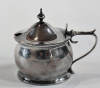 Victorian silver mustard pot, with hinged cover and finial, scroll handle, blue glass liner,