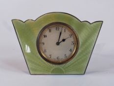 Early 20th century sterling silver and enamel timepiece, tapered with scalloped top edge, pale green