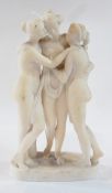 A alabaster figure of the Three Graces, raised on an oval plinth base, height 22cms