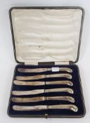 Set of six silver pistol-grip handled tea knives, in a fitted case