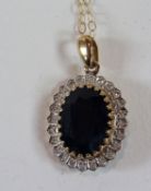 Sapphire and diamond pendant on chain