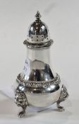 Silver pepperpot, with gadrooned borders, lion mask legs to paw feet, London 1962, height 10cm