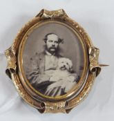 Victorian gold-coloured metal portrait miniature brooch, half-length photographic portrait of a man,