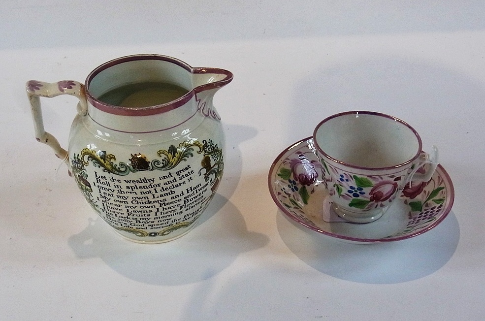 A Sunderland  lustre ware cup and saucer together with a lustre ware jug,  with ploughing scene,