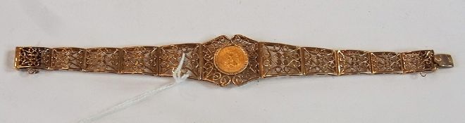 9ct gold bracelet, set small Mexican coin, the bracelet pierced scroll graduated sections
