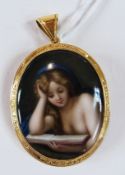 19th century handpainted porcelain pendant in gold coloured metal mount, the mount with floral