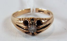 Gold and diamond ring, claw set with split shank