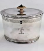 George III tea caddy, oval and straight-sided, having flush-hinged lid, crest engraved and all