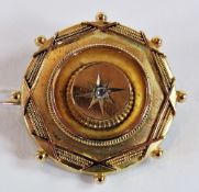 Victorian gold-coloured metal and diamond circular mourning brooch, rosette pattern, centre set