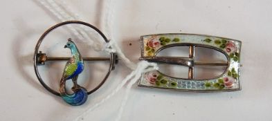 Silver and enamel buckle brooch by Charles Horner, Chester, decorated with roses, and another in the
