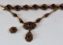 Amethyst paste necklace, matching bracelet and one matching clip-on earring (1 missing)