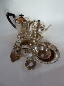 Various assorted silverplate items, including:- teapot, hot water jug, matching teapot, cream jug