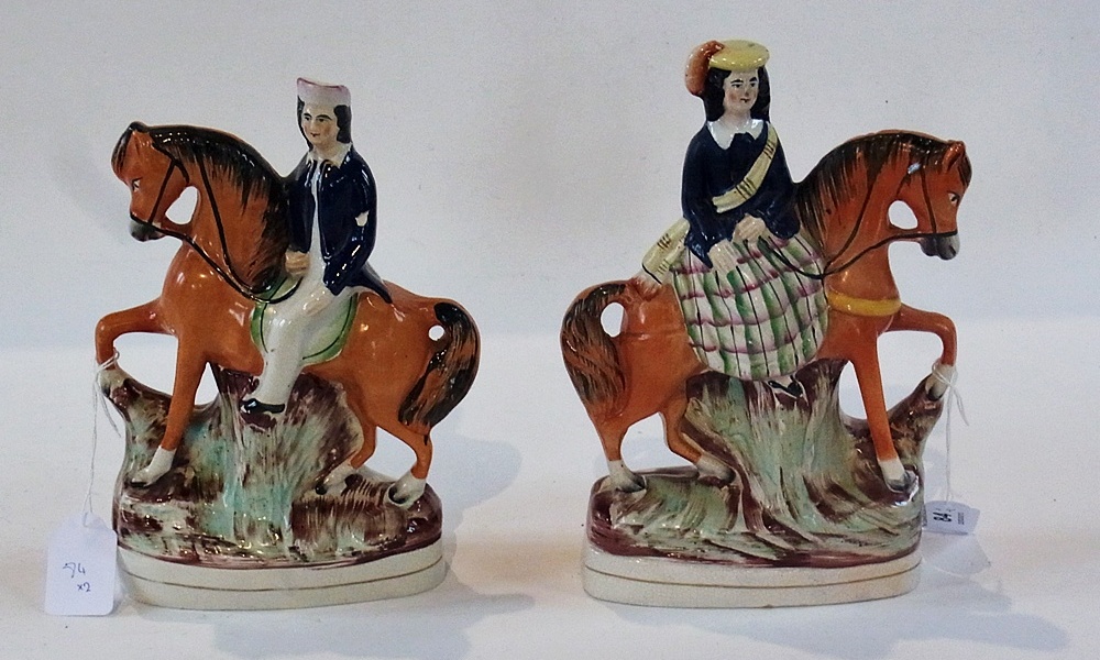 A pair 19th century Staffordshire flatback Scottish figures on horseback