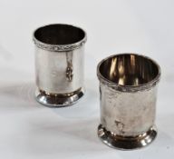 Pair silver cup vases, with engraved border, of plain cylindrical form, raised on a circular foot,