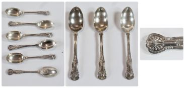 A set of four Victorian silver shell pattern desert spoons, London 1861, 9ozs approximately