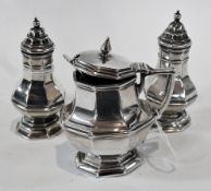 A Victorian silver mustard pot, of octagonal faceted form, with hinged cover, London 1891 together