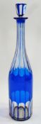 A tall blue flash glass decanter  with stopper (af), 37cm high