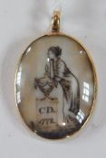 George III gold-coloured metal and ivory (?) mourning pendant, oval and decorated with classical