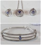 18ct white gold, blue stone and diamond suite of earrings and pendant with chain, the blue stones