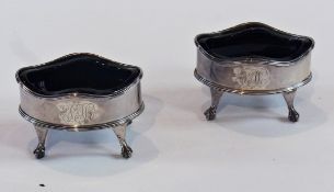 Pair oval silver salts, with reeded wavy borders, raised on claw and ball feet, with cut blue