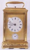 19th century gilded brass carriage clock with half hour repeater and alarm movement, three train and