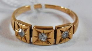 18ct gold and three-stone diamond ring