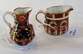 Royal Crown Derby miniature jug, no. 1128 LIV, 4cm high, and another miniature jug, Imari style