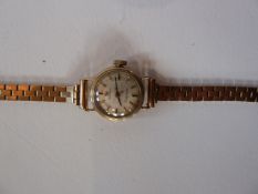 Omega 9ct gold Ladymatic wristwatch, the circular face on 9ct chequered pattern bracelet