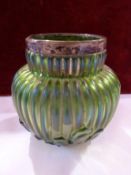 A Loetz style silver rimmed green glass vase, globular shape with reeded relief, 8cm high