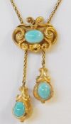 Victorian gold-coloured necklace, with single turquoise set pendant, having open scrollwork to the