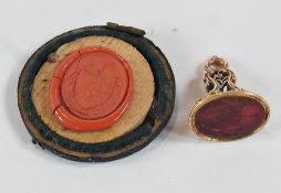 Late Georgian gold-coloured fob, set intaglio carved cornelian, together with wax seal in case, (2)