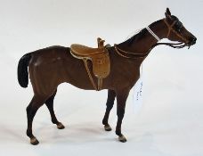 An Austrian Bergmann cold painted bronze horse with side saddle, foundry mark and numbered 3927,