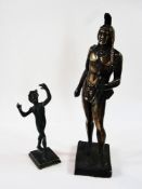 A cast bronze figure of a native American raised on a plinth and another of a dancing man