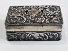 A Victorian silver rectangular box, with C-scroll repousse engraving, London 1894, 6cm long, 2ozs