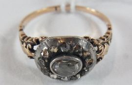 Georgian rose cut diamond cluster ring, set oval stone to the centre and having surround of twelve