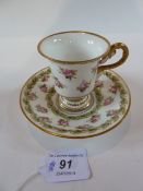 A Swansea handpainted cabinet cup and saucer, decorated with rosebuds and a green leaf trailing