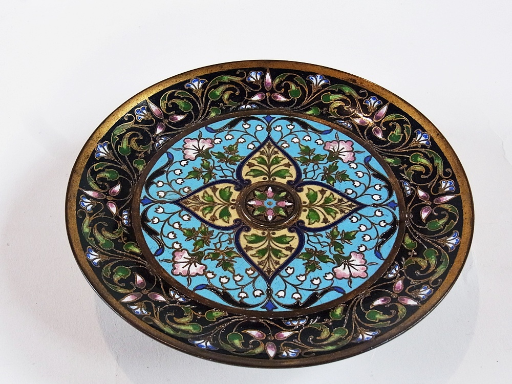 A late nineteenth century English cloisonne tazza with foliate borders and overall flower design