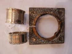 A Victorian silver napkin ring, with wavy edge border, Sheffield 1874, silver engine turned napkin