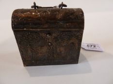 A Dutch silver casket, the turned top with carrying handle, decorated repousse pattern figures in