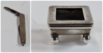 Victorian silver stamp box, with hinged cover, on ball feet, Birmingham 1900, and a pocket knife