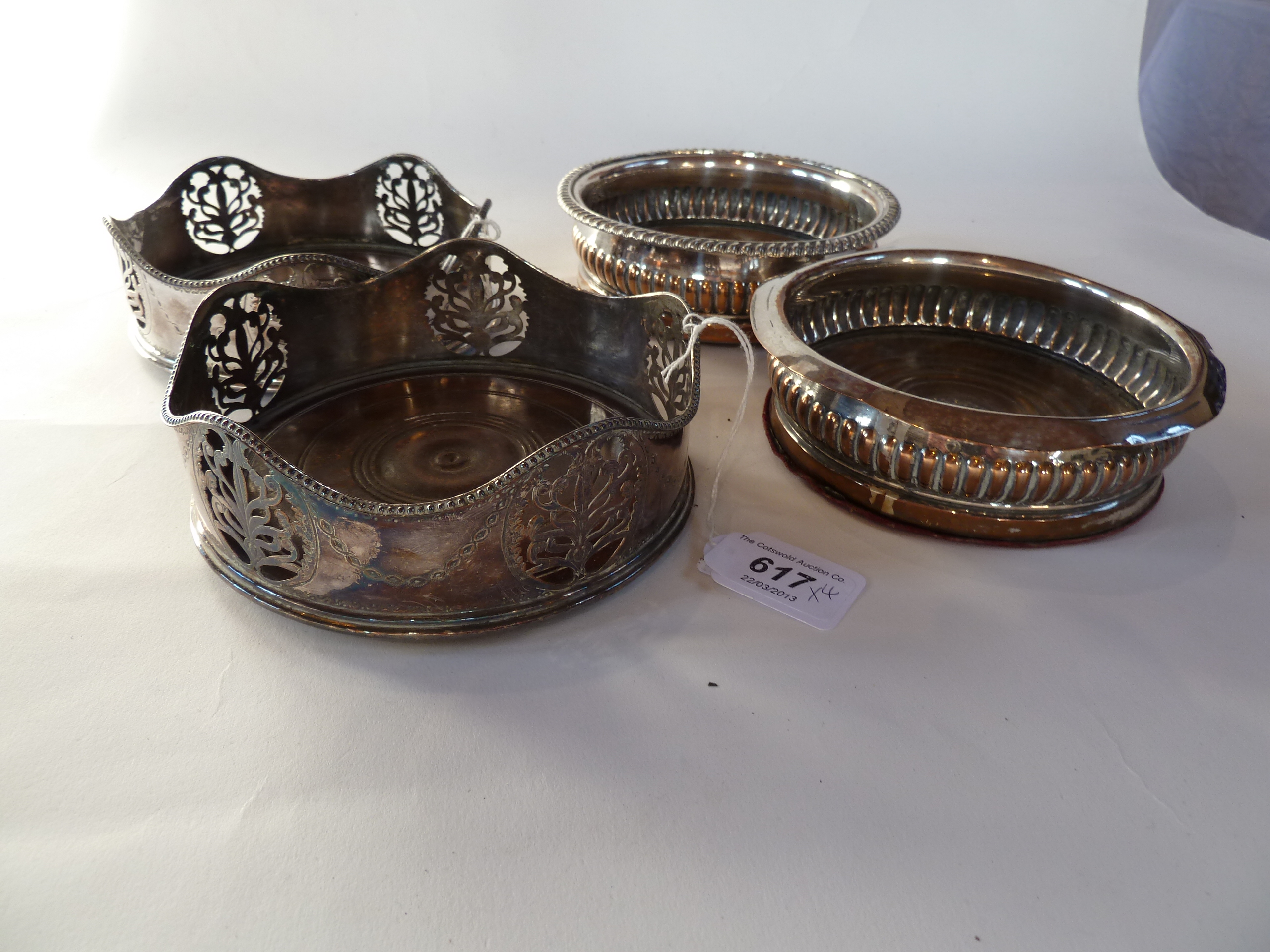 A pair silverplate coaster with wavy rim, openwork design and engraved festoons, and two other