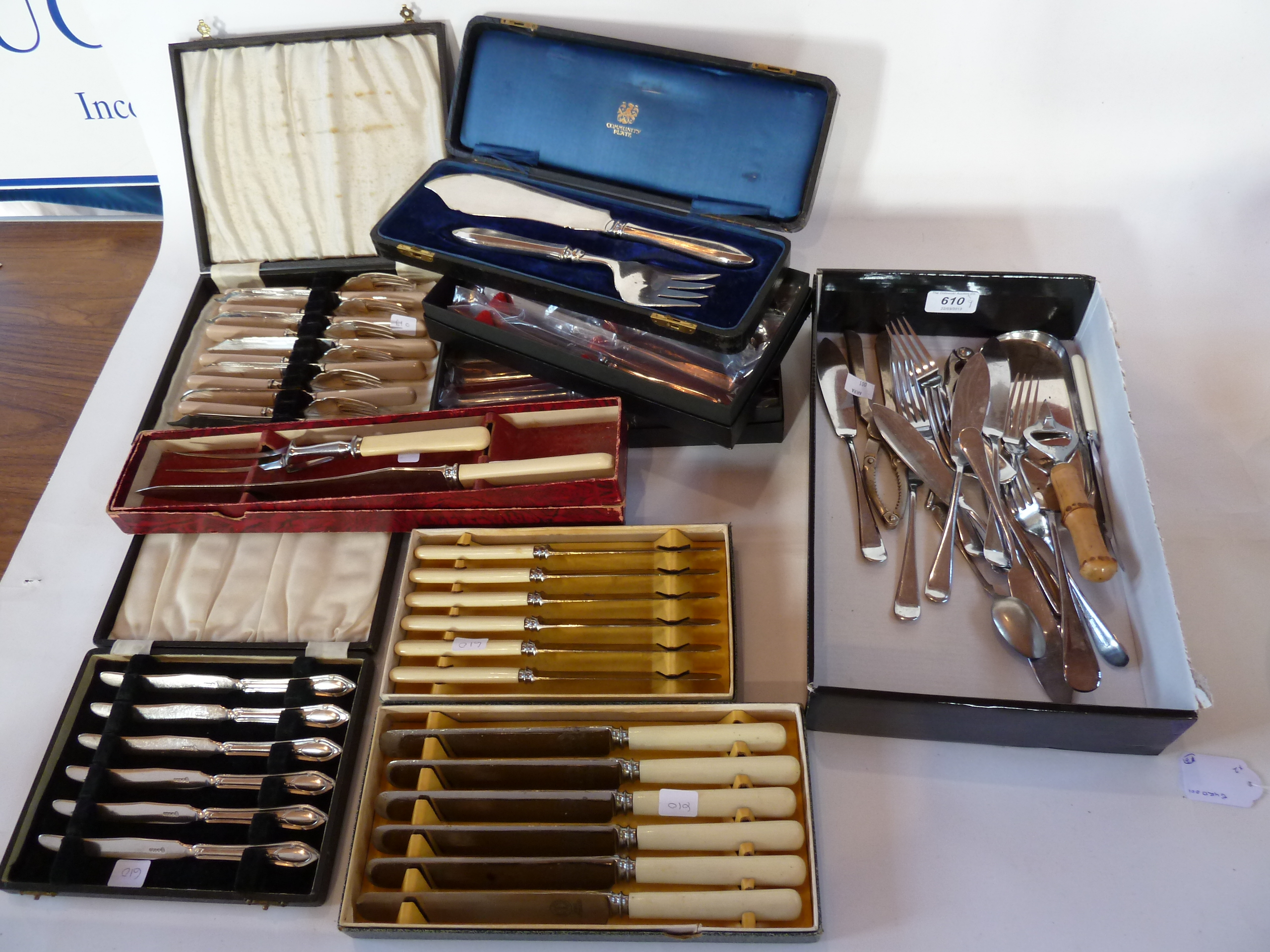 A large quantity of boxed silverplated items including:- knives, bone handled knives, fish knives