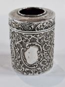 Edwardian silver hair tidy with repousse scrollwork decoration, and cranberry glass liner by