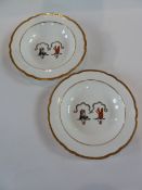 A pair Spode Felspar porcelain plates, decorated with hogshead and a squirrel crested plates with
