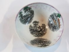 A Sunderland lustre ware bowl, printed with alpine scenes, deer hunting etc