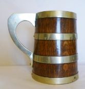An oak quart tankard with plated bands and handle