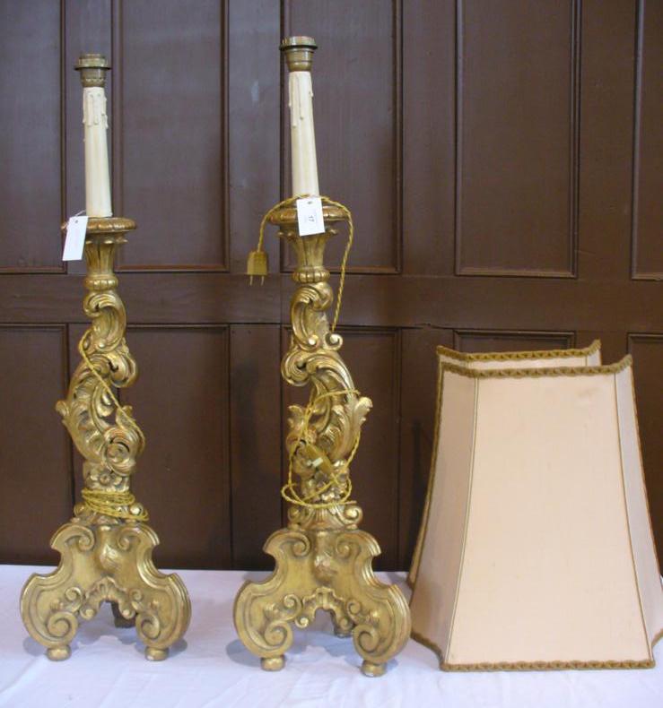 Pair continental eighteenth century style gilt gesso table lamps, foliate column on tripod