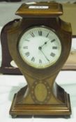 Edwardian inlaid mahogany mantel timepiece, with raised pediment, shield-shaped case with waisted