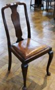 Set of four Queen Anne style fiddleback dining chairs, with drop in leather seats on cabriole legs