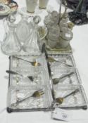 A six piece glass hors d'oeuvres dish  in plated stand with six serving forks, pair oil/vinegar jugs